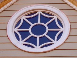 Legacy Round Direct Set Window with R6 gothic grid pattern.